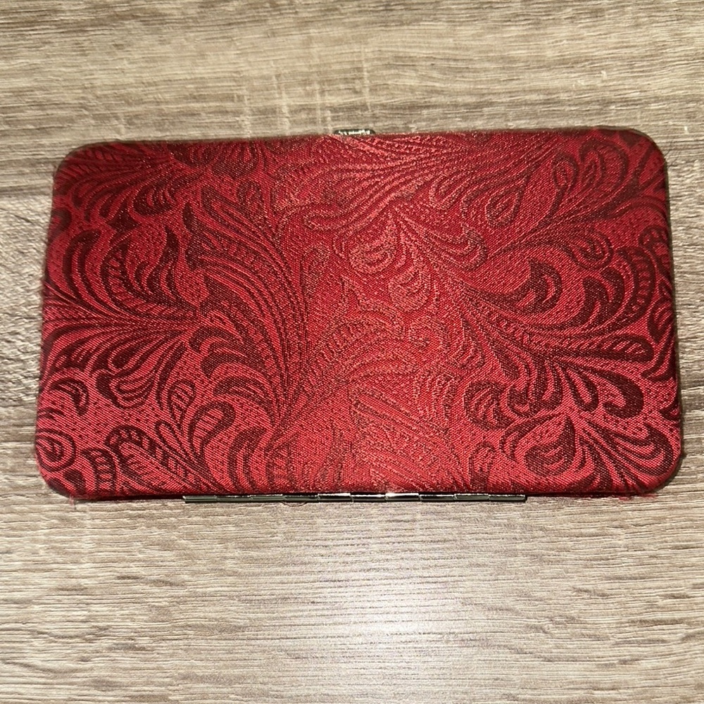 Red Embossed Laptop Case with Ornate Design